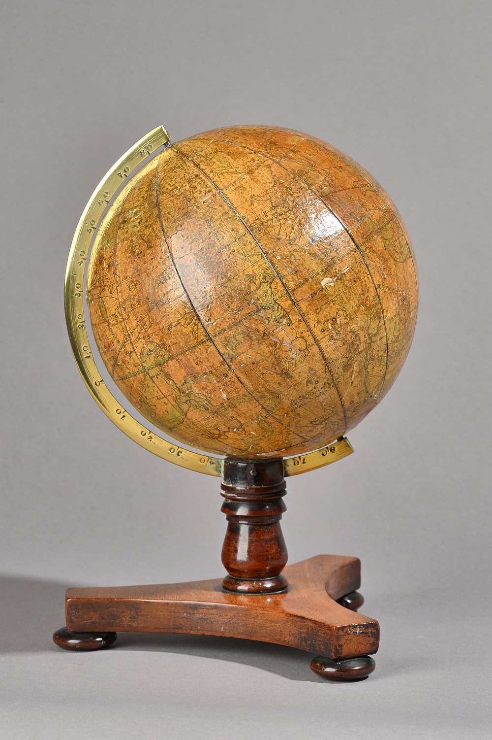 A Bale & Woodward six inch celestial globe, probably mid-19th century, on a mahogany tri-form stand,