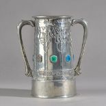 A Liberty Tudric pewter two handled pewter loving cup by David Veazey,