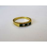 A gold, emerald and diamond five stone ring,