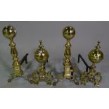 A pair of Victorian style brass andirons of turned globular form,