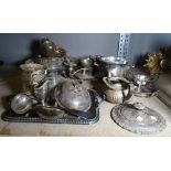 Silver plated wares, including; cocktail shaker, tray, jugs, candlesticks and sundry, (qty).