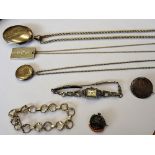 Mostly silver jewellery, comprising; an oval pendant locket, with a ropetwist link neckchain,
