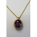 A gold, amethyst and cultured pearl pendant,