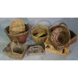 A large quantity of 20th century wicker baskets and trays of various sizes, (qty).