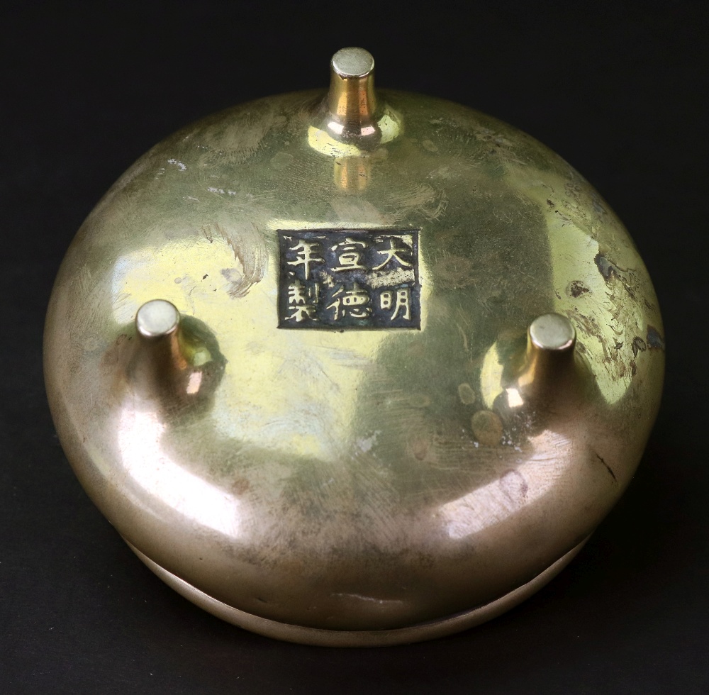 A Small Chinese bronze two handled tripod censer, six character Xuande mark but later, - Image 4 of 5