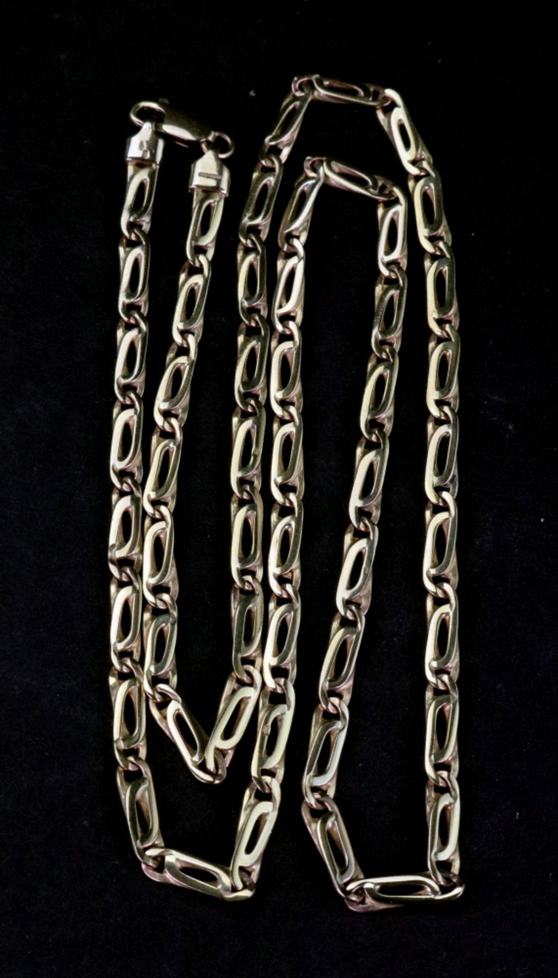 A 9ct gold fancy link chain, 17.10g gross.