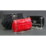 Lulu Guinness; a red leather handbag, with cotton interior printed with 'red lips',