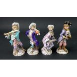 Four Meissen monkey band figures, late 19th century,