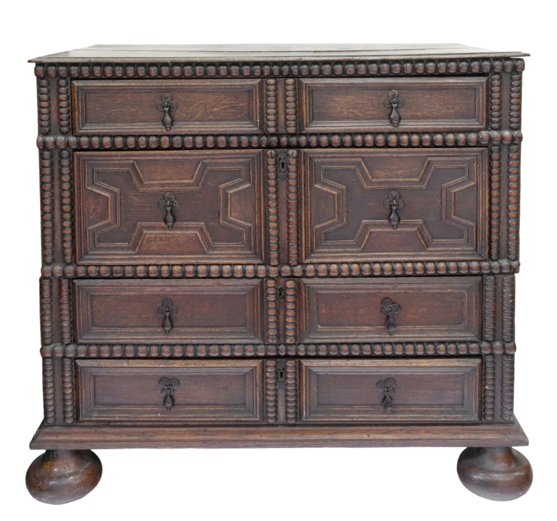 A late 17th century oak chest, in two parts, of panelled construction,