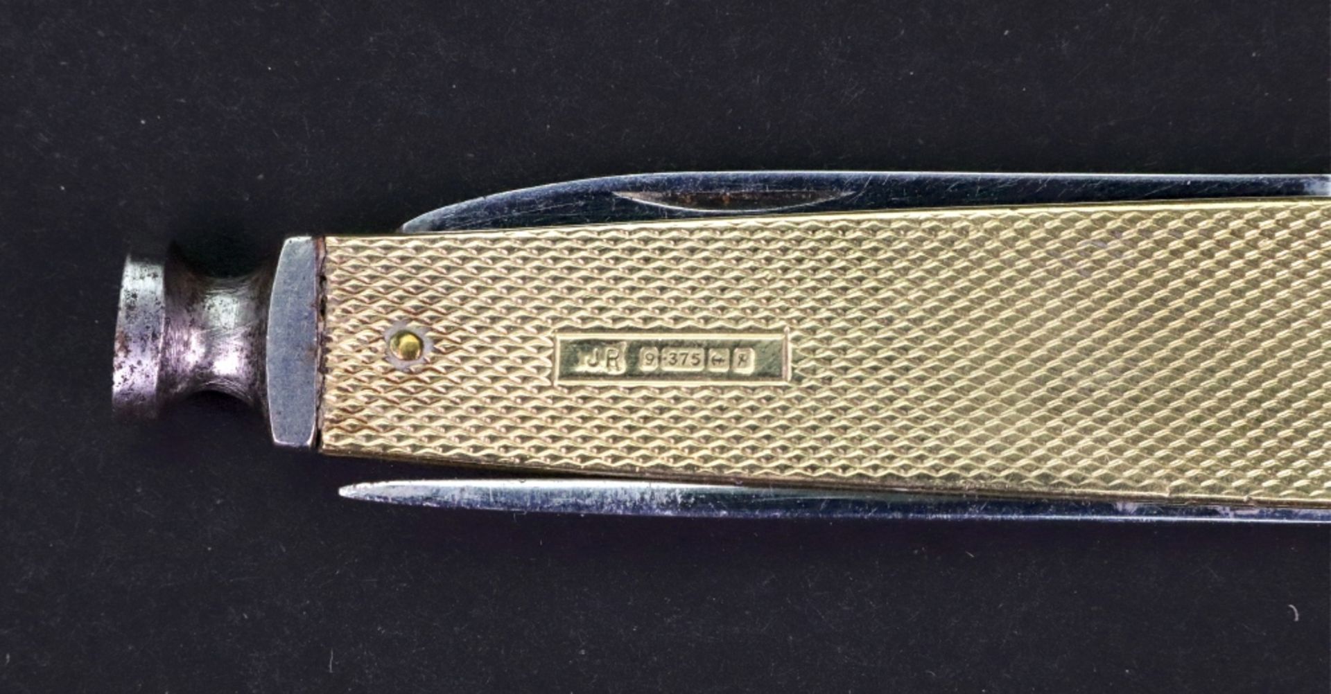 A 9ct gold mounted steel penknife, Birmingham 1964, engine turned with vacant cartouche, 7cm long. - Image 3 of 4