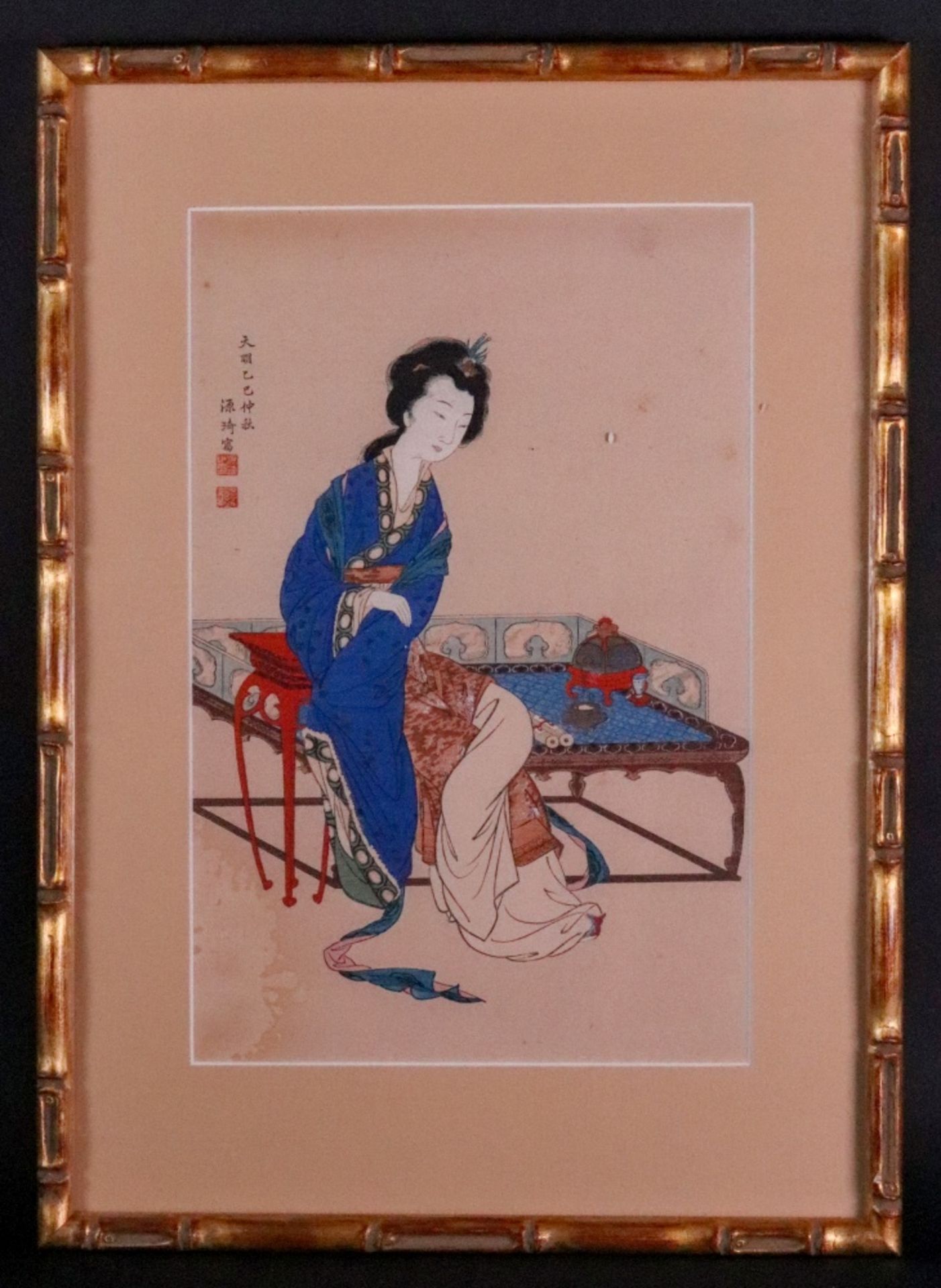 A Japanese woodblock print of a seated lady, signed, 29 x 19cm. - Image 2 of 2
