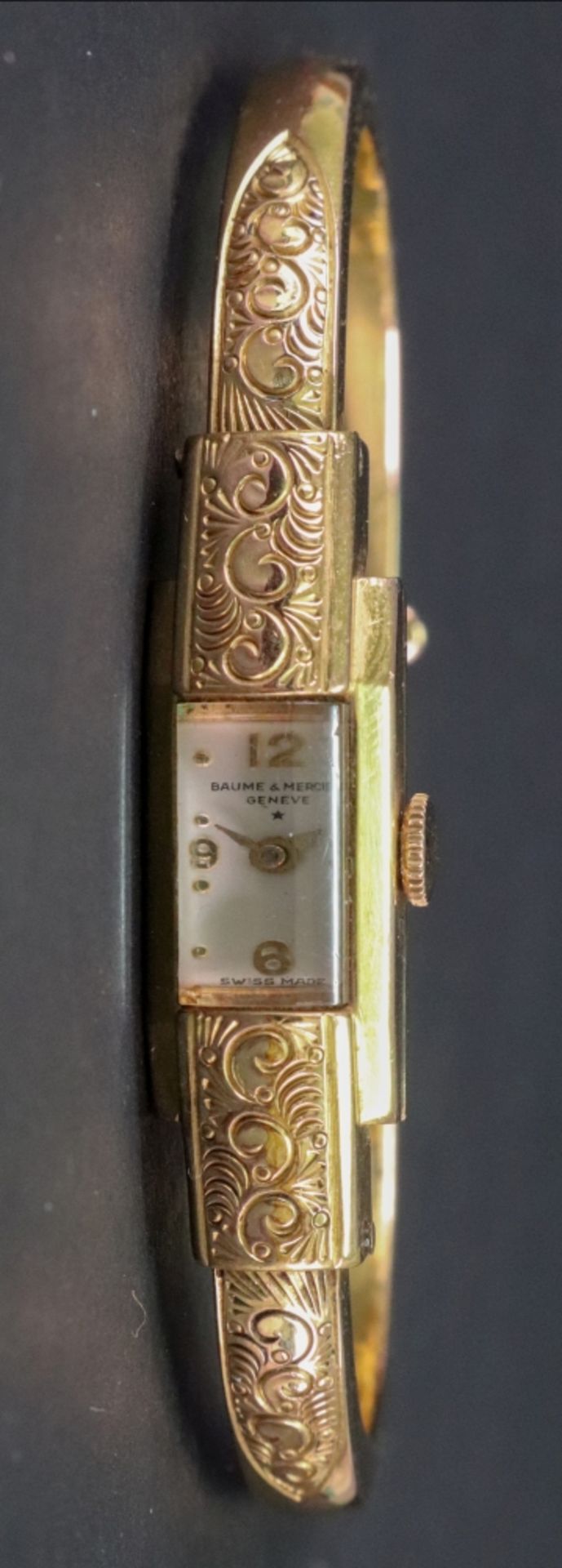 Baume & Mercier, Geneve; a lady's gold plated bangle wristwatch, - Image 2 of 3