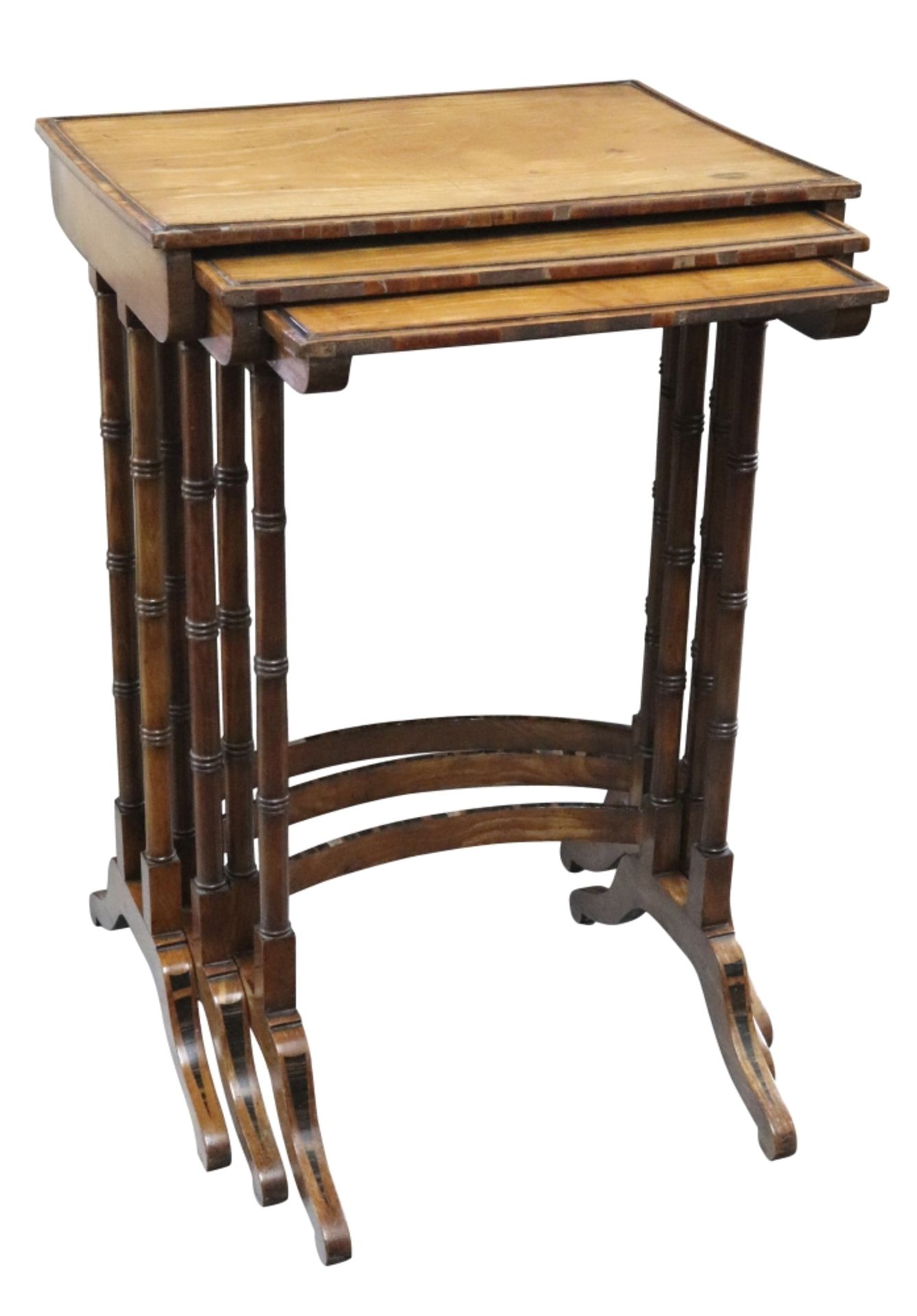 A nest of three Regency satinwood and coromandel wood tables,