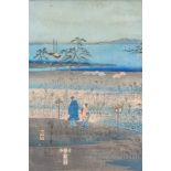A Japanese woodblock print of two figures in a coastal landscape, 37 x 24.5cm.
