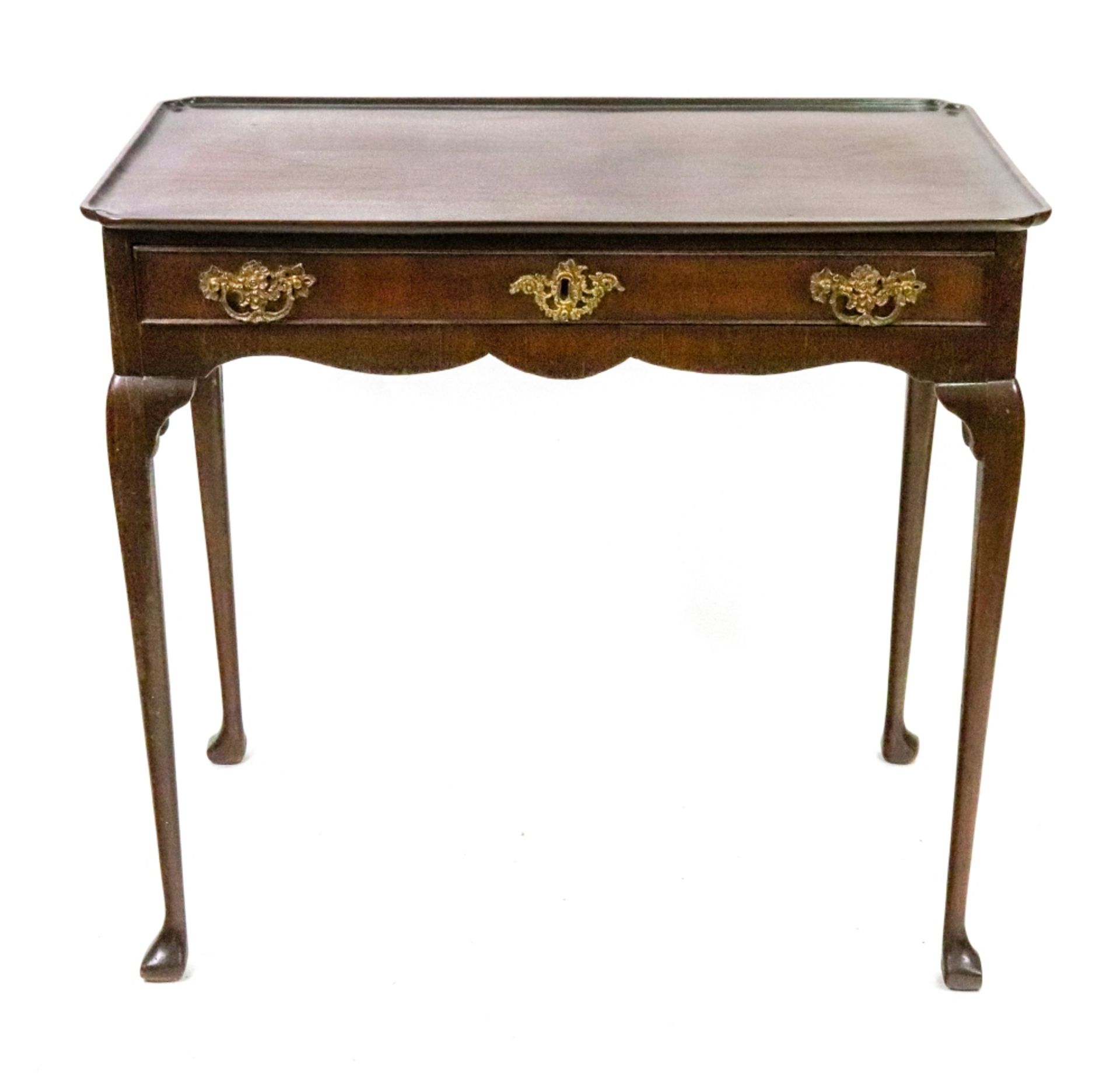 A mid 18th century and later mahogany silver table,