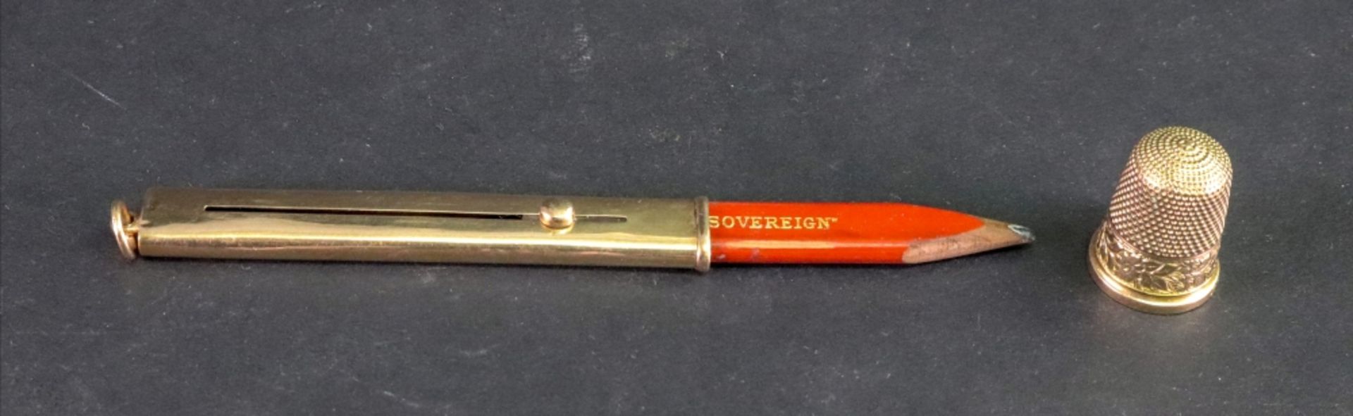 A 9ct gold cased pencil, S. Mordan & Co, London 1915, with sliding action, 7cm long, inscribed 'M. - Image 2 of 2