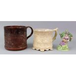 An unusual Staffordshire earthenware mug, 19th century,
