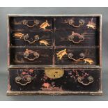 A Japanese black lacquer table cabinet, Meiji period, of rectangular form,