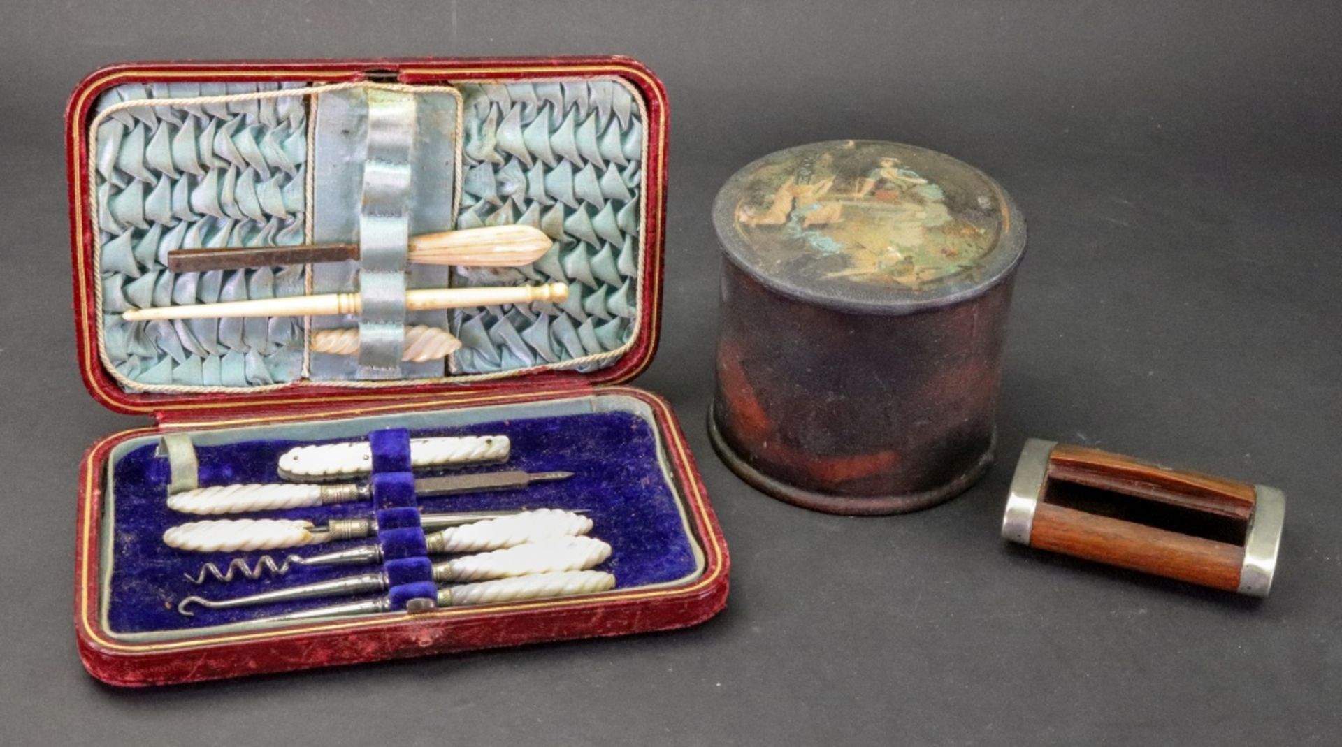A Victorian rectangular leather cased manicure set, silk and velvet lined,