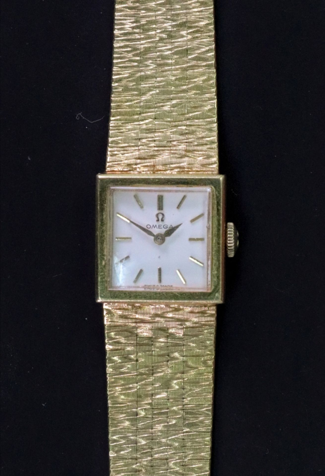 Omega; a lady's 18ct gold wristwatch,