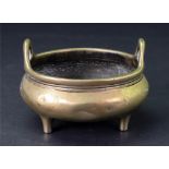 A Small Chinese bronze two handled tripod censer, six character Xuande mark but later,