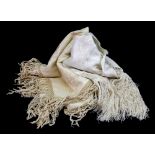 A white silk shawl, decorated with a floral design, 223cm long, together with another floral shawl,
