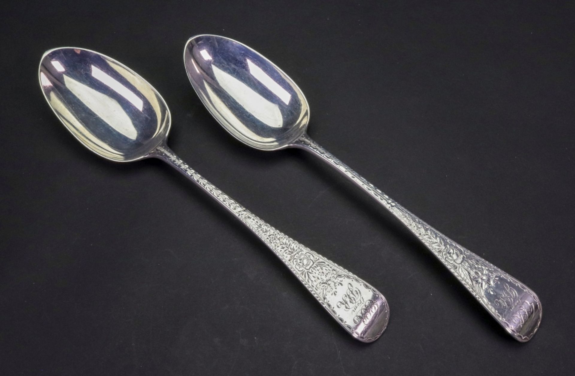 A pair of Victorian Old English pattern silver serving spoons, George W Adams, London 1870,