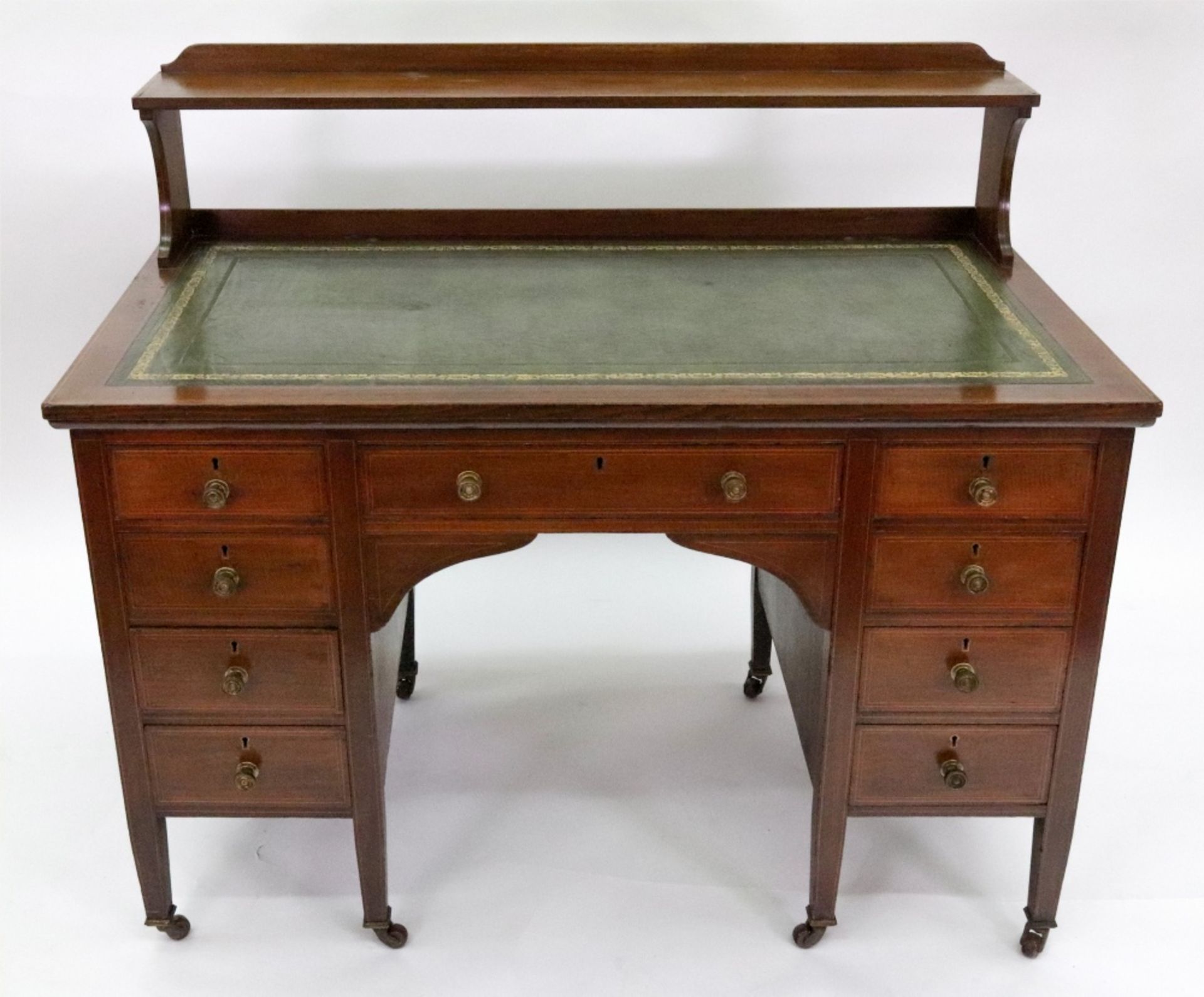 An Edwardian mahogany boxwood strung kneehole desk,