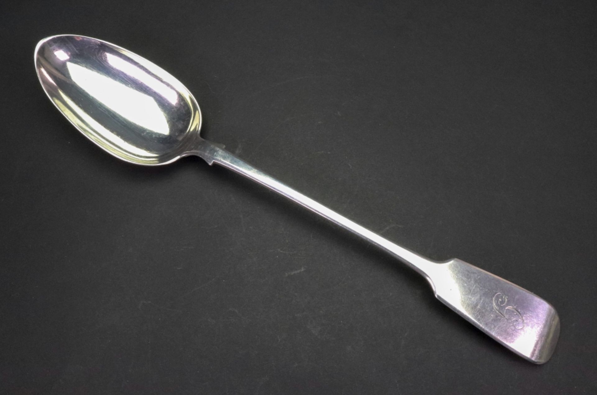 A Victorian silver fiddle pattern basting spoon, William Eaton, London 1839, 4ozs, initialled 'G'.