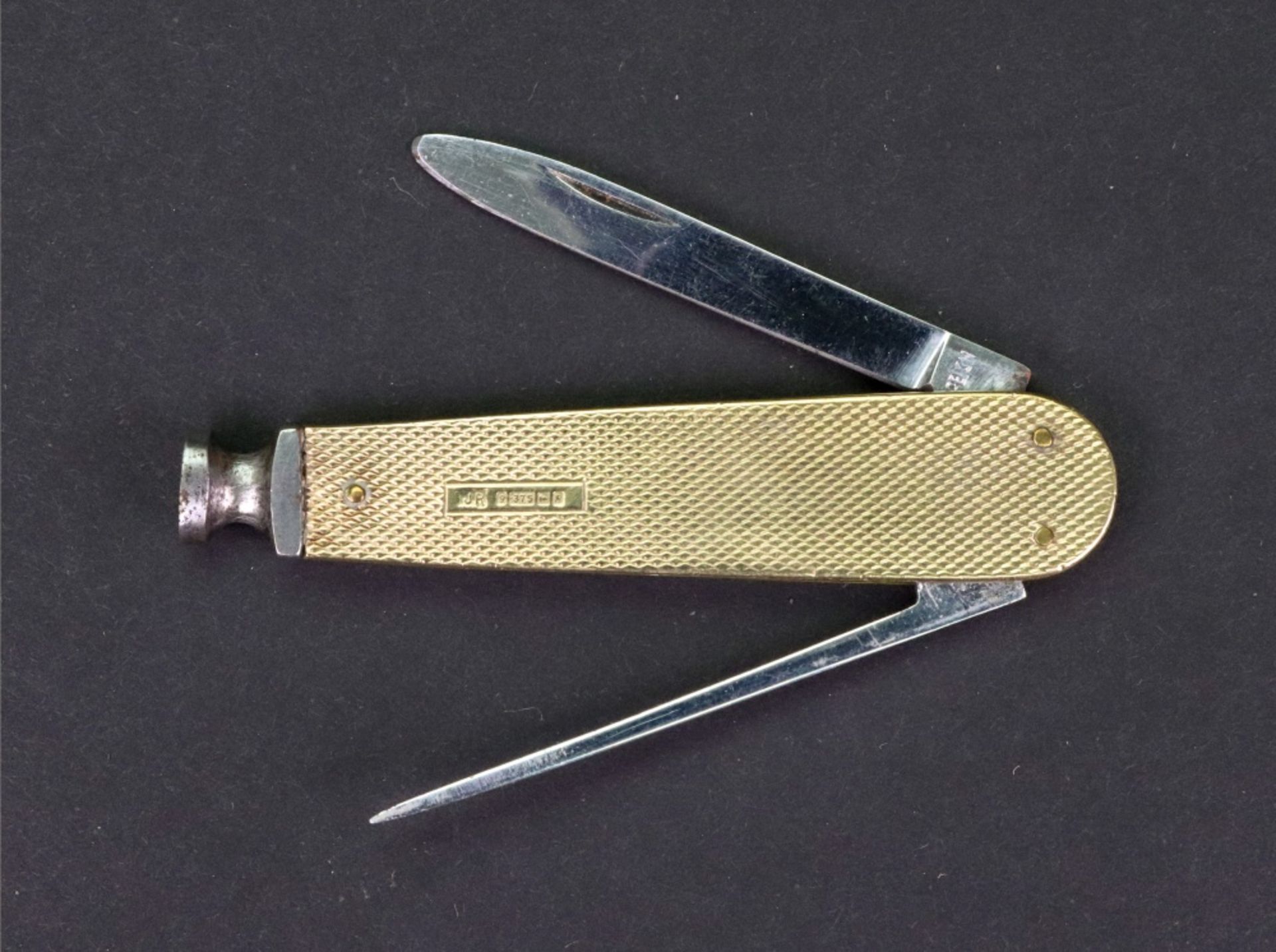 A 9ct gold mounted steel penknife, Birmingham 1964, engine turned with vacant cartouche, 7cm long. - Image 2 of 4