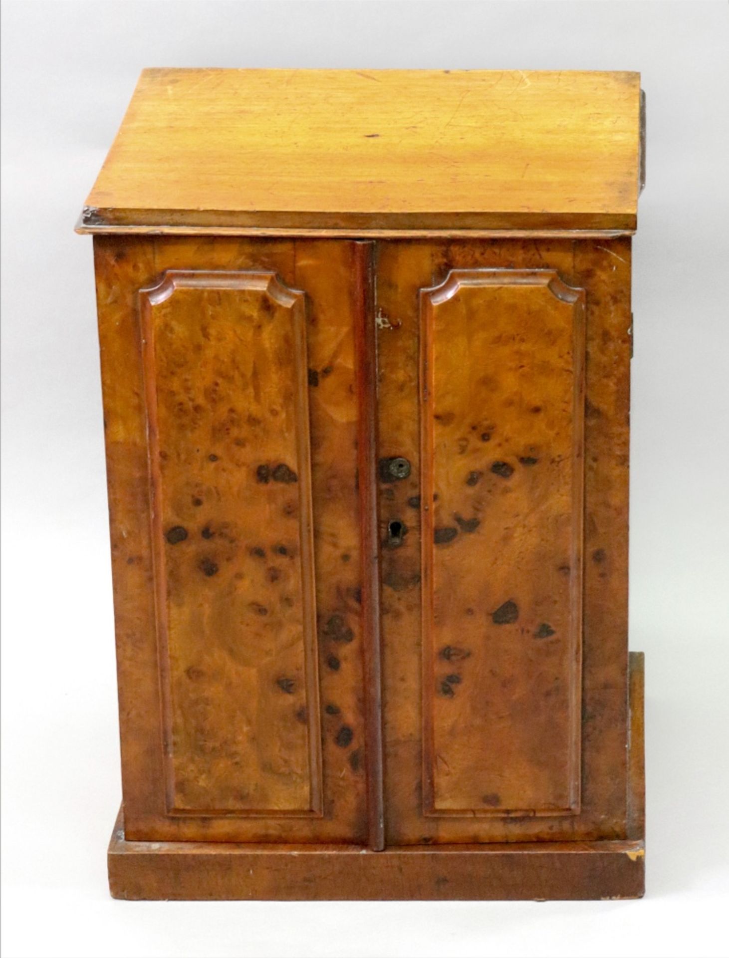 A collector's Victorian walnut and mahogany table top cabinet, circa 1880,