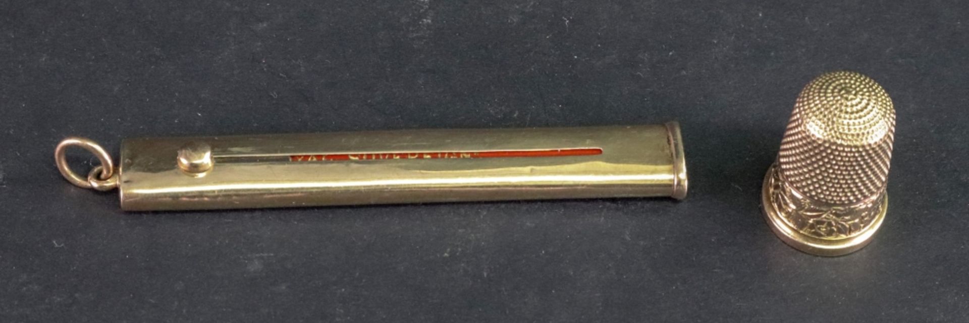 A 9ct gold cased pencil, S. Mordan & Co, London 1915, with sliding action, 7cm long, inscribed 'M.