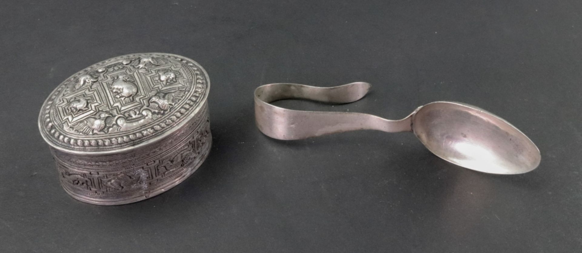 A child's Indian silver spoon, Hamilton & Co, Calcutta, with scroll handle and oval bowl, 11.