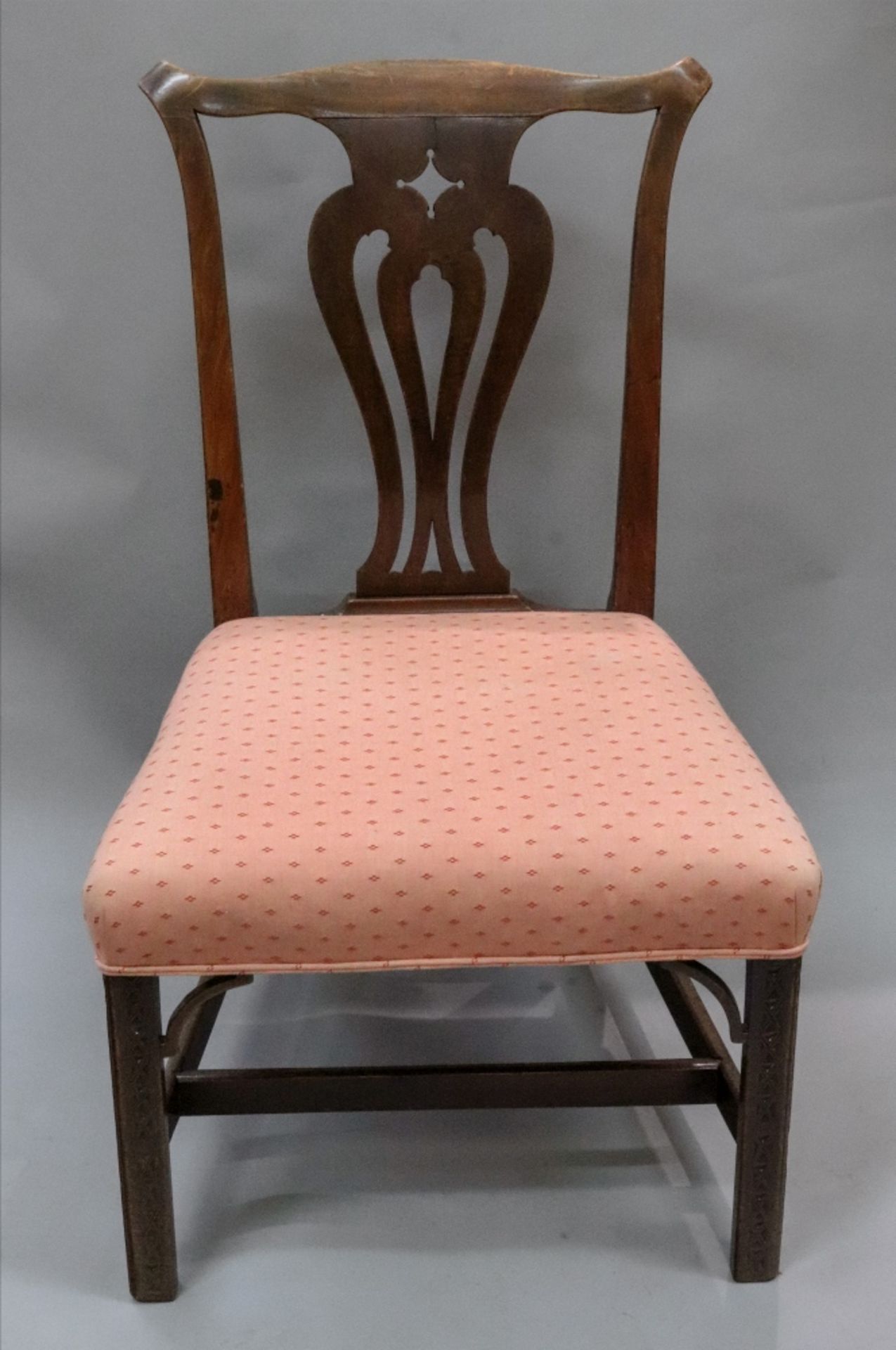 A George III Chippendale style mahogany dining chair, with undulating top rail,