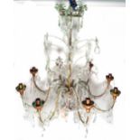 A modern gilt metal and glass eight branch chandelier,