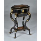 A late 19th century French floral marquetry inlaid ebonised lady's dressing table,