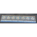 A long Chinese embroidered blue-ground border hanging, 19th century,
