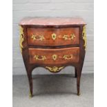 A Louis XV style commode with serpentine marble top,