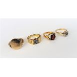 A 15ct gold and garnet single stone ring,