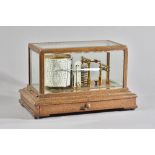 AN EDWARDIAN OAK CASED BAROGRAPH By Negretti and Zambra, London, No.