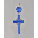 A lapis lazuli and diamond set pendant cross,