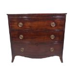 A George III mahogany bowfront chest, with brushing slide over three long drawers,