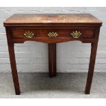 A mid-18th century mahogany rectangular tea table, on double fold-out canted square supports,