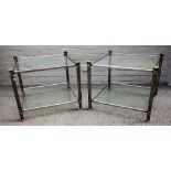 A pair of mid-20th century design brass and steel two tier square occasional tables,