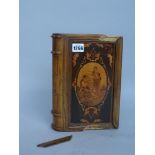 An Italian marquetry inlaid fruitwood cigar box, modelled as a Victorian leather bound book,