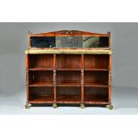 A Regency brass mounted concave bookcase,