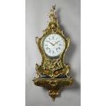 A LOUIS XV ORMOLU-MOUNTED GREEN AND FOLIATE LACQUERED BRACKET CLOCK AND BRACKET By Bichon A