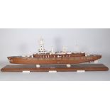 An oak and ivory mounted scale model of a war ship, circa.