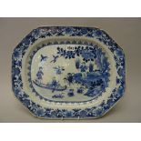 A Chinese blue and white export octagonal dish, Qianlong, painted with two figures on a river,