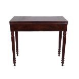 A Regency mahogany foldover card table, on reeded tapering supports, 86cm wide x 43cm deep.